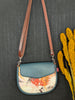 petit sac rond à porter en bandoulière ou à la taille. Fait à la main à Montréal